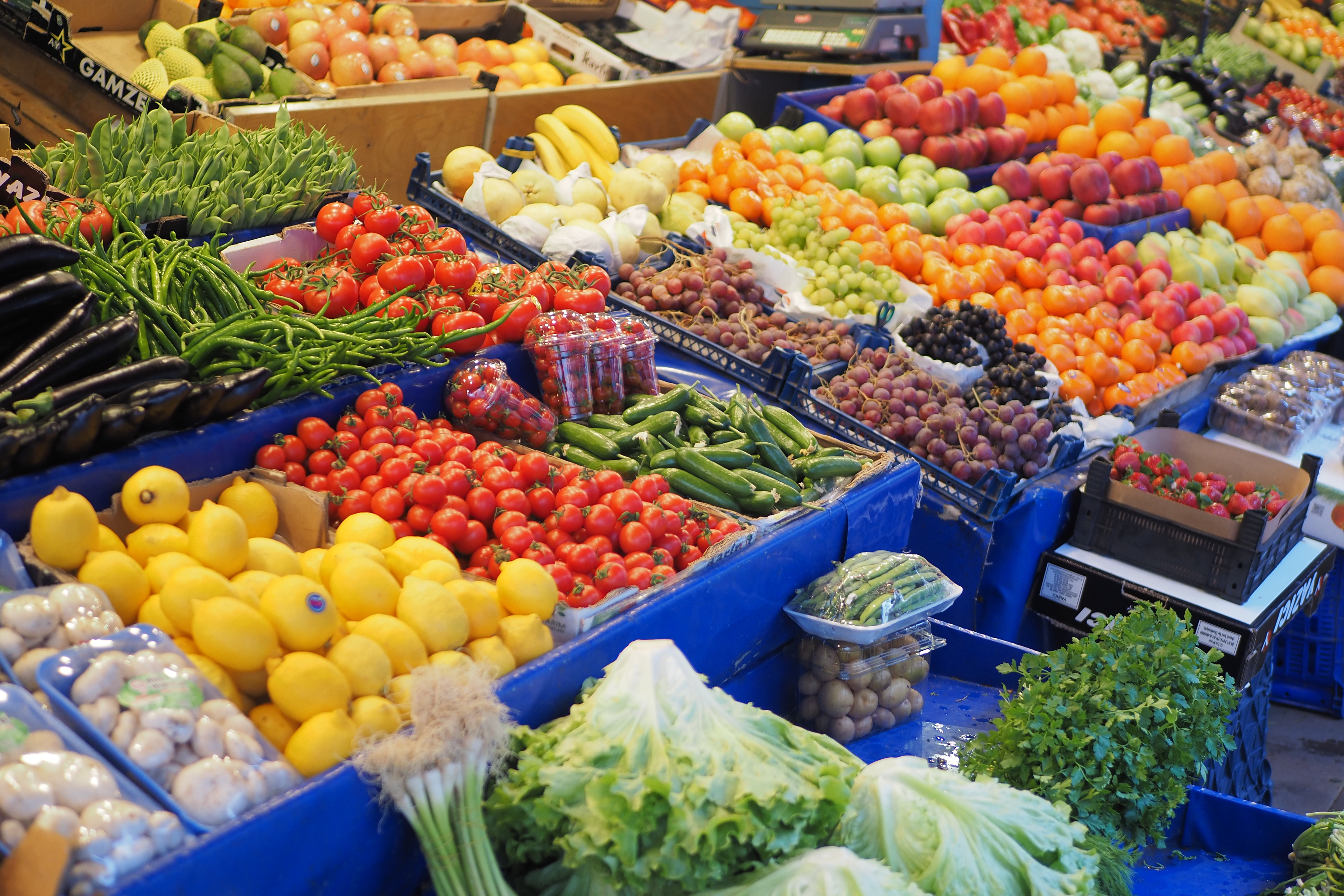 fresh vegetables selling in a super shop in turkey .